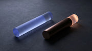 Two translucent columns representing insulated and non-insulated RF microneedling tip energy delivery patterns.