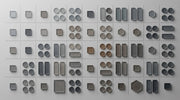 Abstract grid of translucent tokens representing the Morpheus8 tip family and applicator catalog structure.