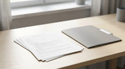 Plain regulatory document and neutral folder on a bright desk