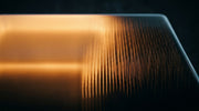 Continuous warm glow beside a field of fine light filaments, contrasting surface RF heating with needle-delivered RF
