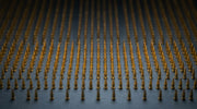 Ordered grid of gold-toned points illustrating Sylfirm X tips and their precision-manufactured electrode array