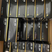 Multiple boxes of Sylvermx XB-49 products stacked inside a cardboard box.