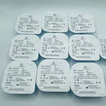 Multiple medical adhesive patches with text on a gray background